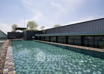 Luxurious rooftop pool with stunning city views and modern design.