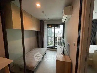 Modern apartment with compact study area and city view balcony