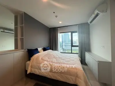 Modern bedroom with city view and stylish decor