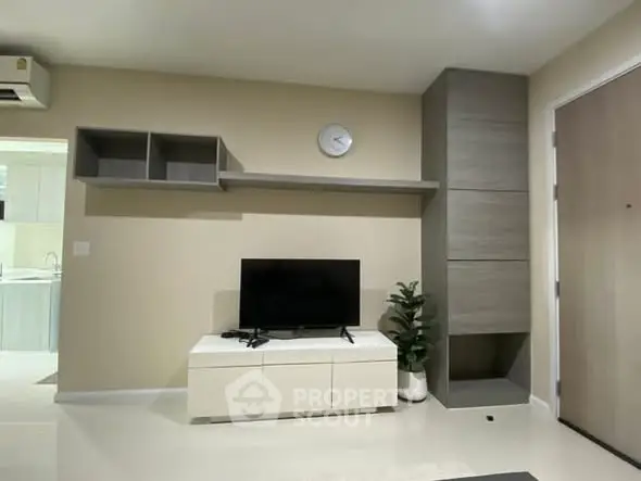 Modern living room with sleek TV stand and wall-mounted shelves