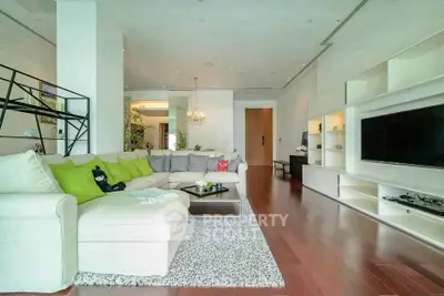 Spacious modern living room with elegant decor and large sectional sofa