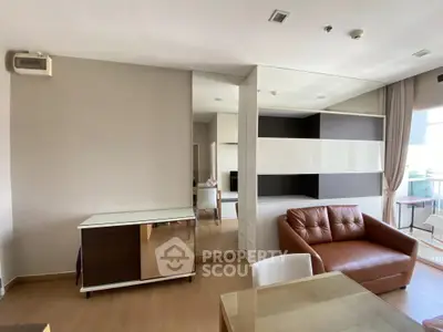 Modern living room with leather sofa and sleek storage solutions