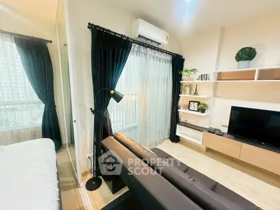 Modern living room with sleek furniture and natural light