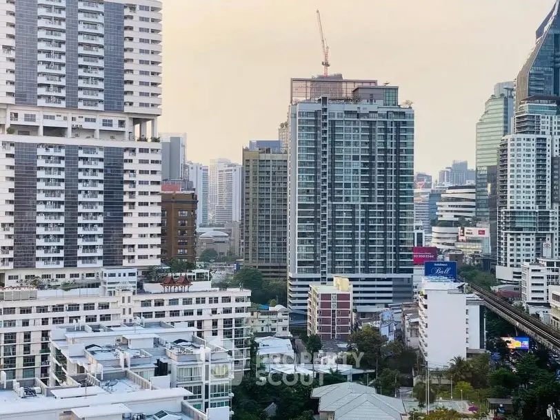 Stunning cityscape view showcasing modern high-rise buildings in a bustling urban environment.
