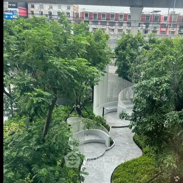 Lush garden view with modern spiral pathways in urban setting