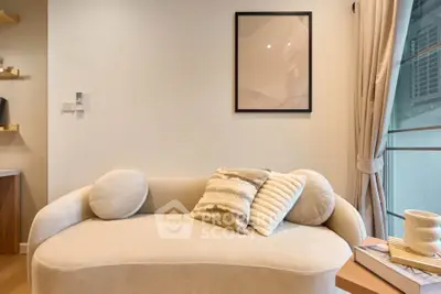 Modern living room with stylish beige sofa and elegant decor