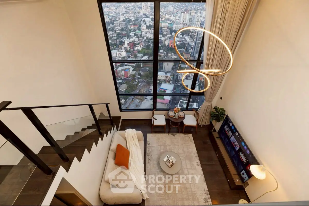 Luxurious high-rise living room with stunning city view and modern decor