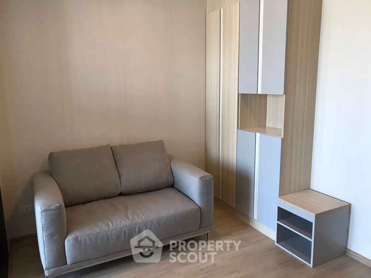 Cozy living room with modern sofa and stylish storage unit