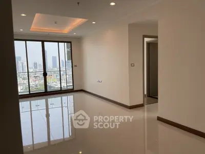 Spacious modern apartment with city view and elegant lighting