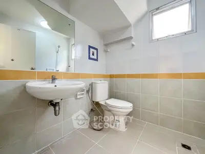 Modern bathroom with sleek fixtures and natural light