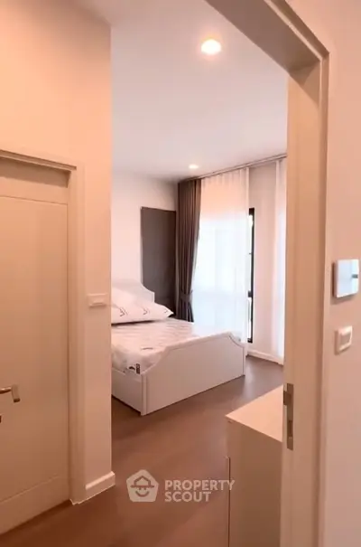 Modern bedroom with natural light and minimalist decor