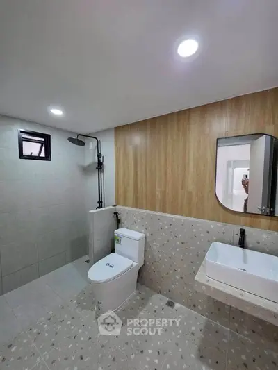 Modern bathroom with sleek fixtures and stylish tile design