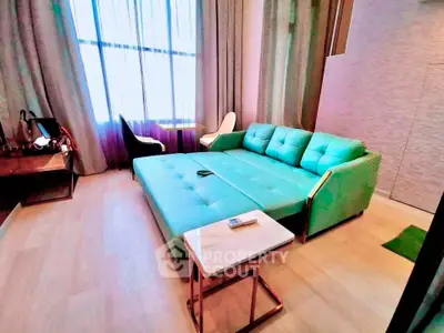 Spacious living room with modern sofa bed and elegant decor