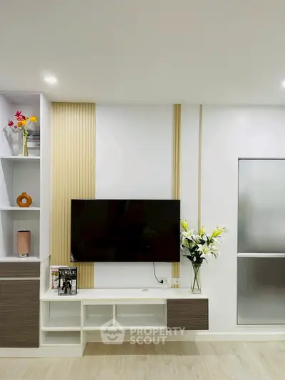 Modern living room with sleek TV unit and stylish decor