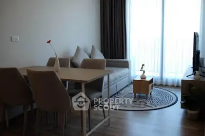 Modern living room with stylish furniture and natural light