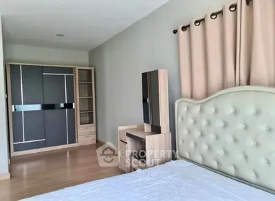 Spacious bedroom with modern furniture and elegant decor