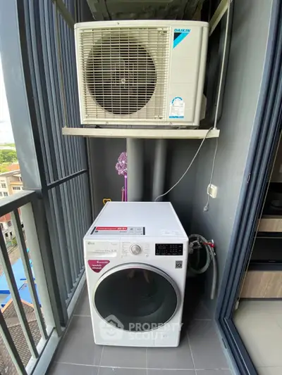 Modern balcony with washing machine and air conditioning unit, perfect for urban living convenience.