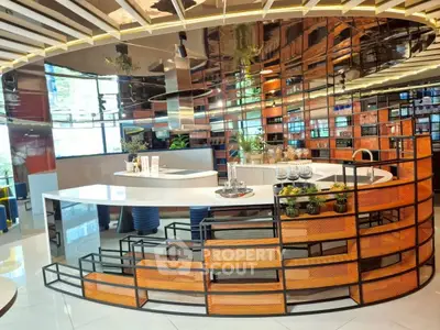 Modern kitchen with sleek design and open layout, featuring stylish countertops and contemporary decor.