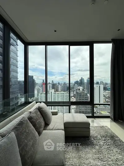 Luxurious living room with panoramic city view and modern decor