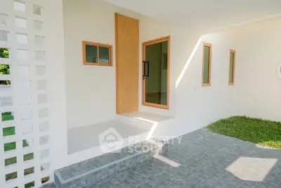 Modern minimalist home entrance with clean lines and natural light