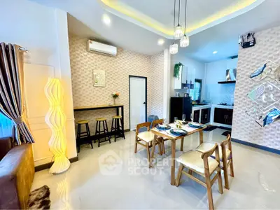Modern open-layout dining area with stylish decor and contemporary lighting in a cozy apartment.