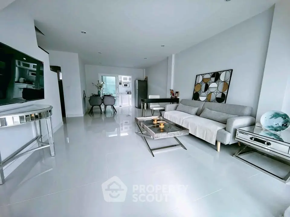 Spacious modern living room with sleek furniture and elegant decor