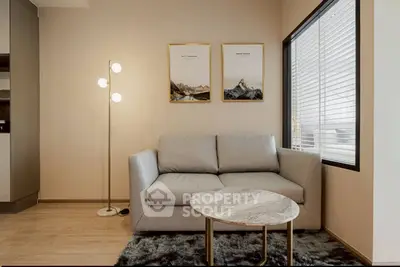 Modern living room with cozy sofa and stylish decor