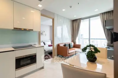 Modern apartment interior with open kitchen and cozy living area