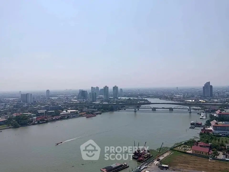 Stunning cityscape view with river and skyline, perfect for urban living enthusiasts.