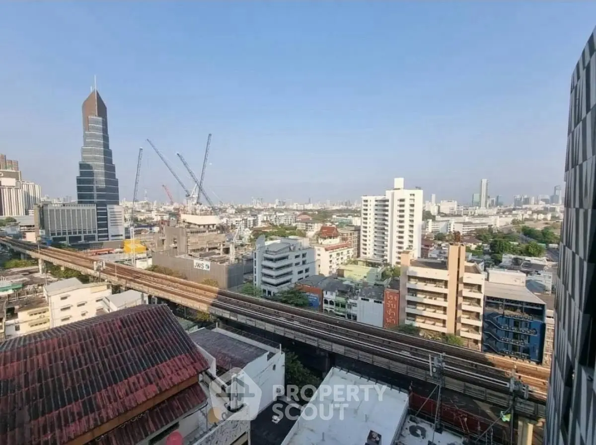 Stunning cityscape view with modern skyscrapers and urban railway, perfect for urban living enthusiasts.