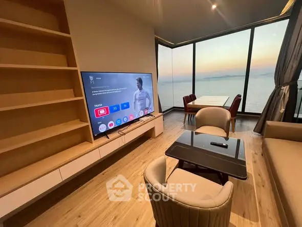 Luxurious living room with panoramic sea view and modern furnishings