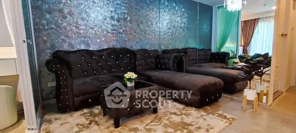 Luxurious living room with plush velvet sofas and elegant decor