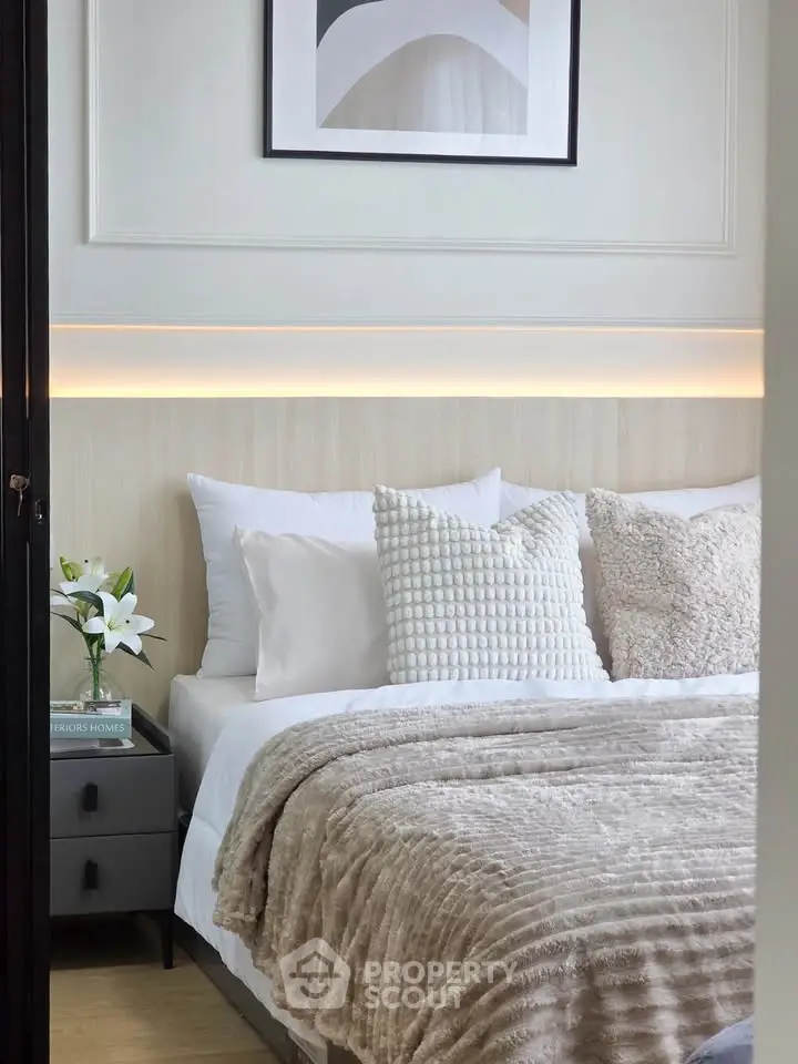 Luxurious bedroom with plush bedding and modern decor, perfect for relaxation and comfort.