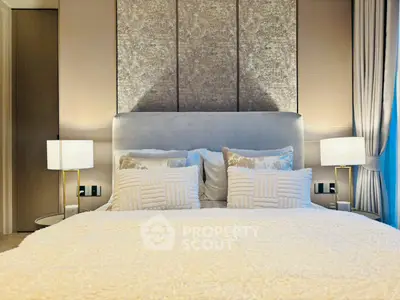 Luxurious bedroom with elegant decor and plush bedding, perfect for relaxation and comfort.