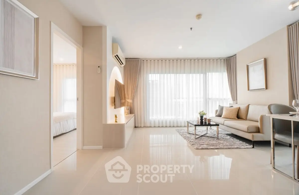 Spacious modern living room with elegant decor and natural light