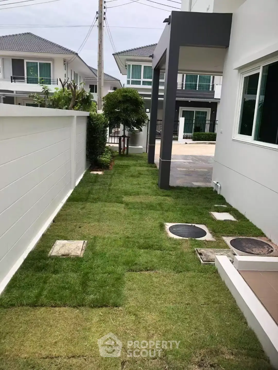 Modern townhouse with freshly landscaped garden and contemporary design.