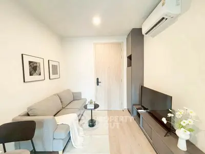 Cozy modern living room with stylish decor and air conditioning