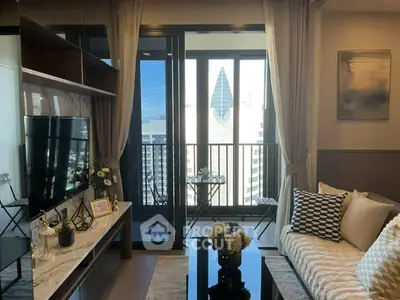 Chic living room with balcony view in modern high-rise apartment
