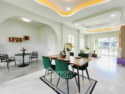 Spacious modern living and dining area with elegant decor and natural light