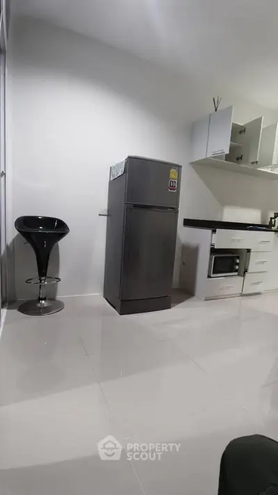 Modern kitchen with sleek appliances and minimalist design