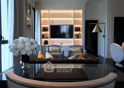 Luxurious living room with elegant decor and built-in shelving