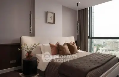 Luxurious bedroom with city view, featuring elegant decor and plush bedding in a high-rise apartment.