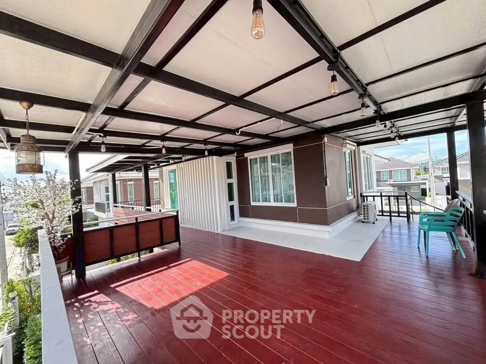 Spacious rooftop terrace with modern design and ample seating, perfect for outdoor relaxation and entertainment.