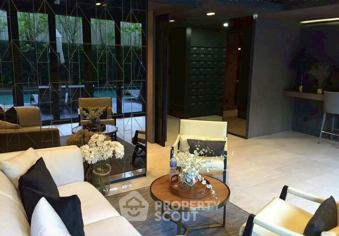 Luxurious modern living room with elegant decor and pool view