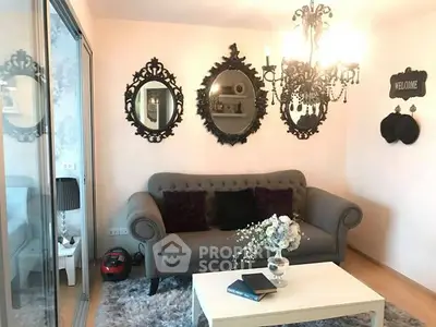 Charming living room with elegant decor, plush sofa, and ornate mirrors creating a cozy ambiance.