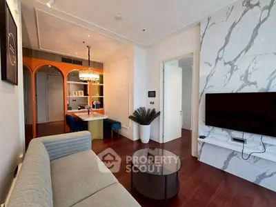 Modern living room with stylish decor and marble accent wall
