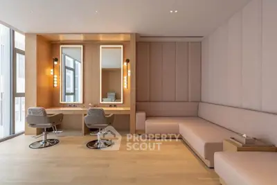Luxurious modern living room with elegant seating and stylish mirrors, perfect for relaxation and entertaining.