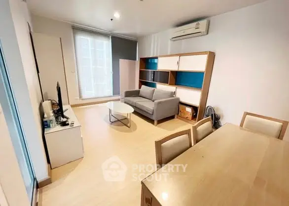 Modern living room with sleek furniture and natural light