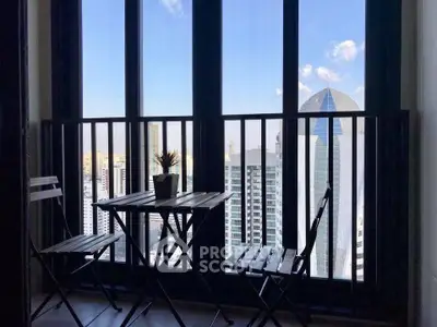 Chic urban balcony with stunning cityscape view and modern seating