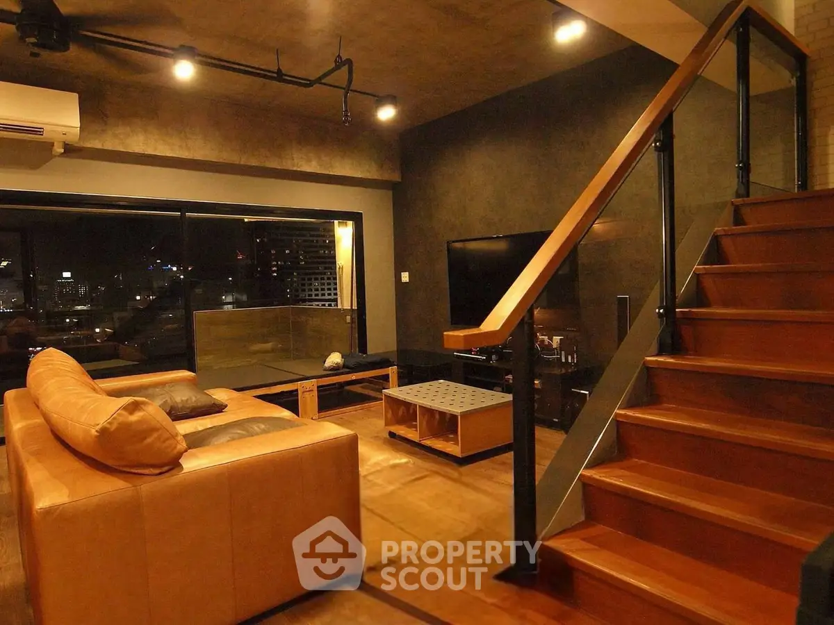 Luxurious modern living room with stylish staircase and city view